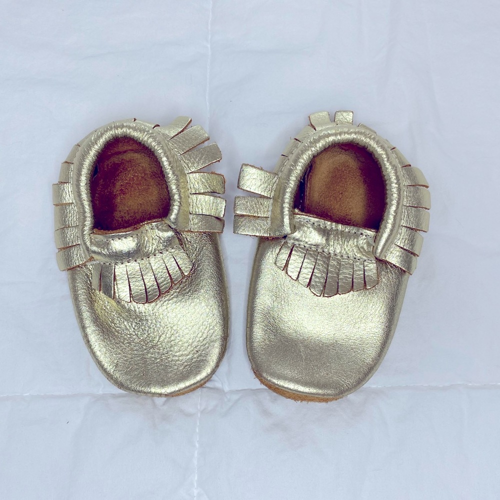 Gold moccasins